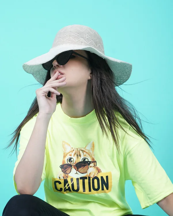 Model in sunglasses and a wide brim hat